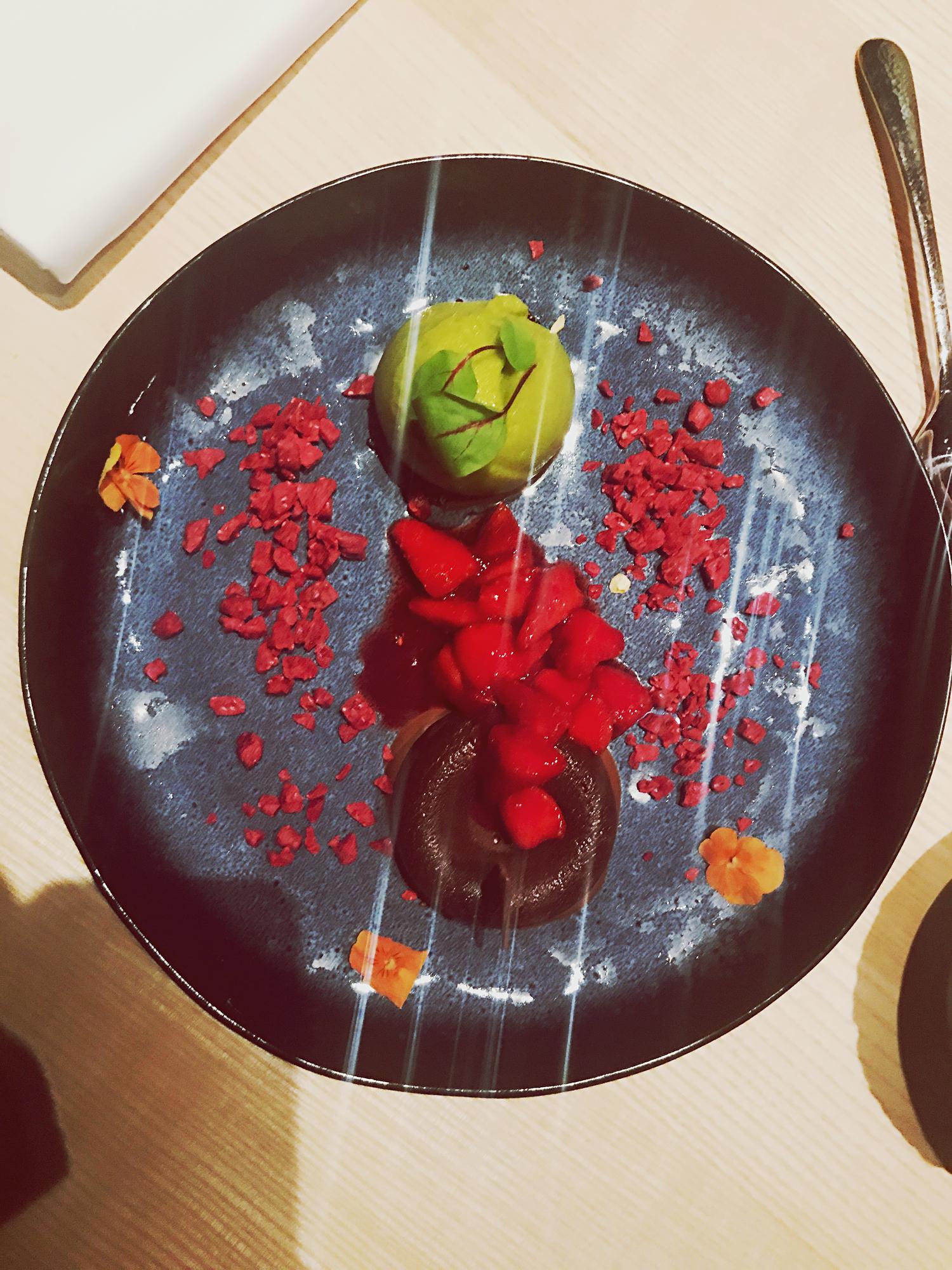 High-contrast product shot of plated seasonal menu